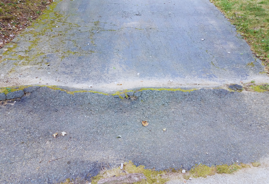 Bumpy asphalt driveway